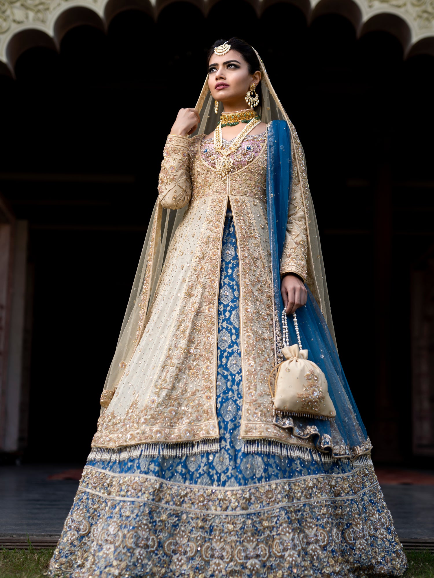 Golden jacket with teal lehenga