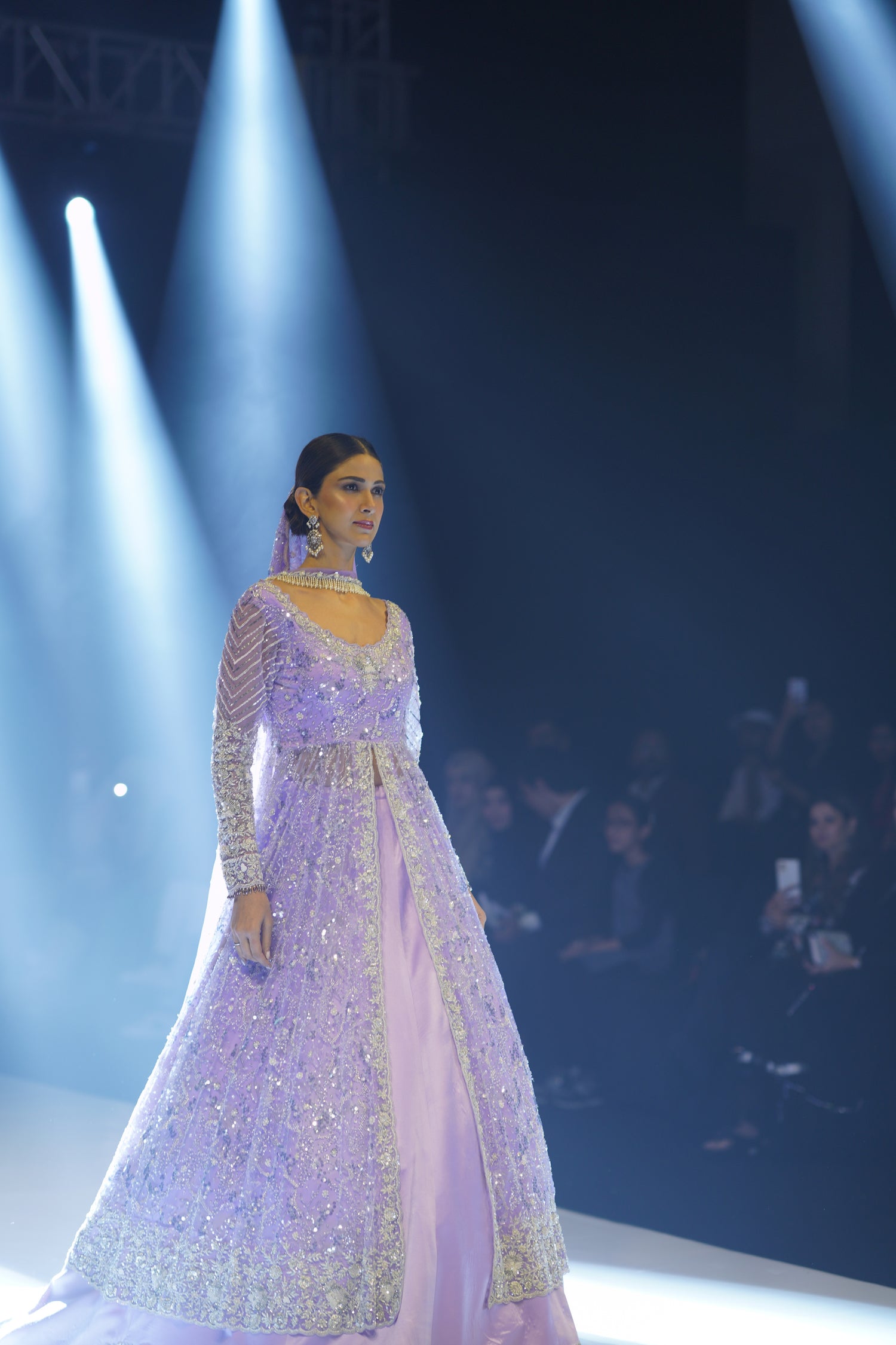 Lavendar gown with a trail